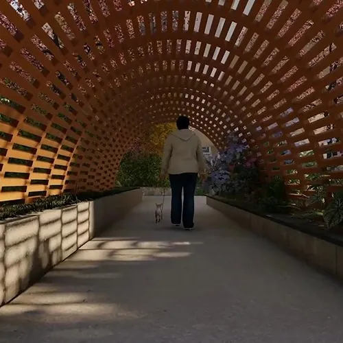 A shaded pergola walkway lined with planters at Aparna Sarovar Towers