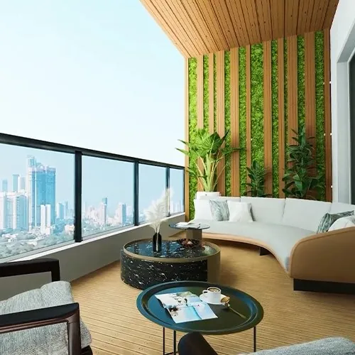 A balcony lounge with a sofa and a city view at Aparna Sarovar Towers